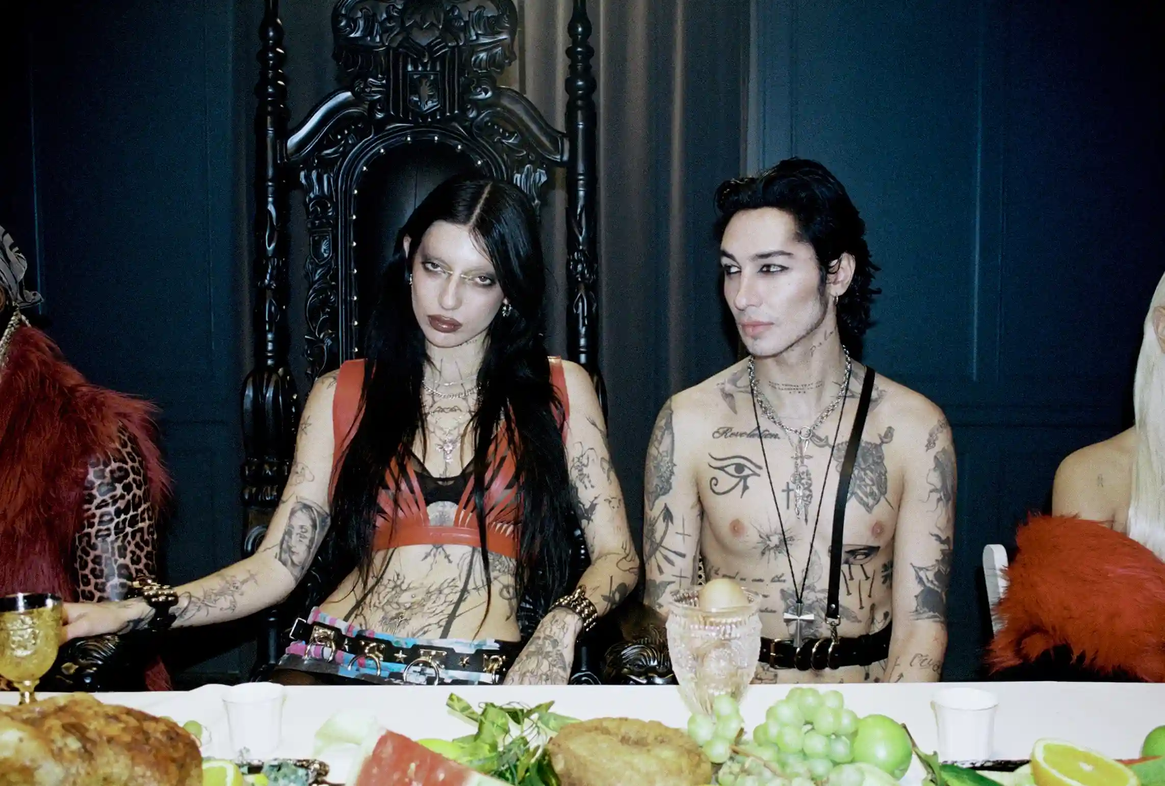 DeathByRomy with her co-artist sitting