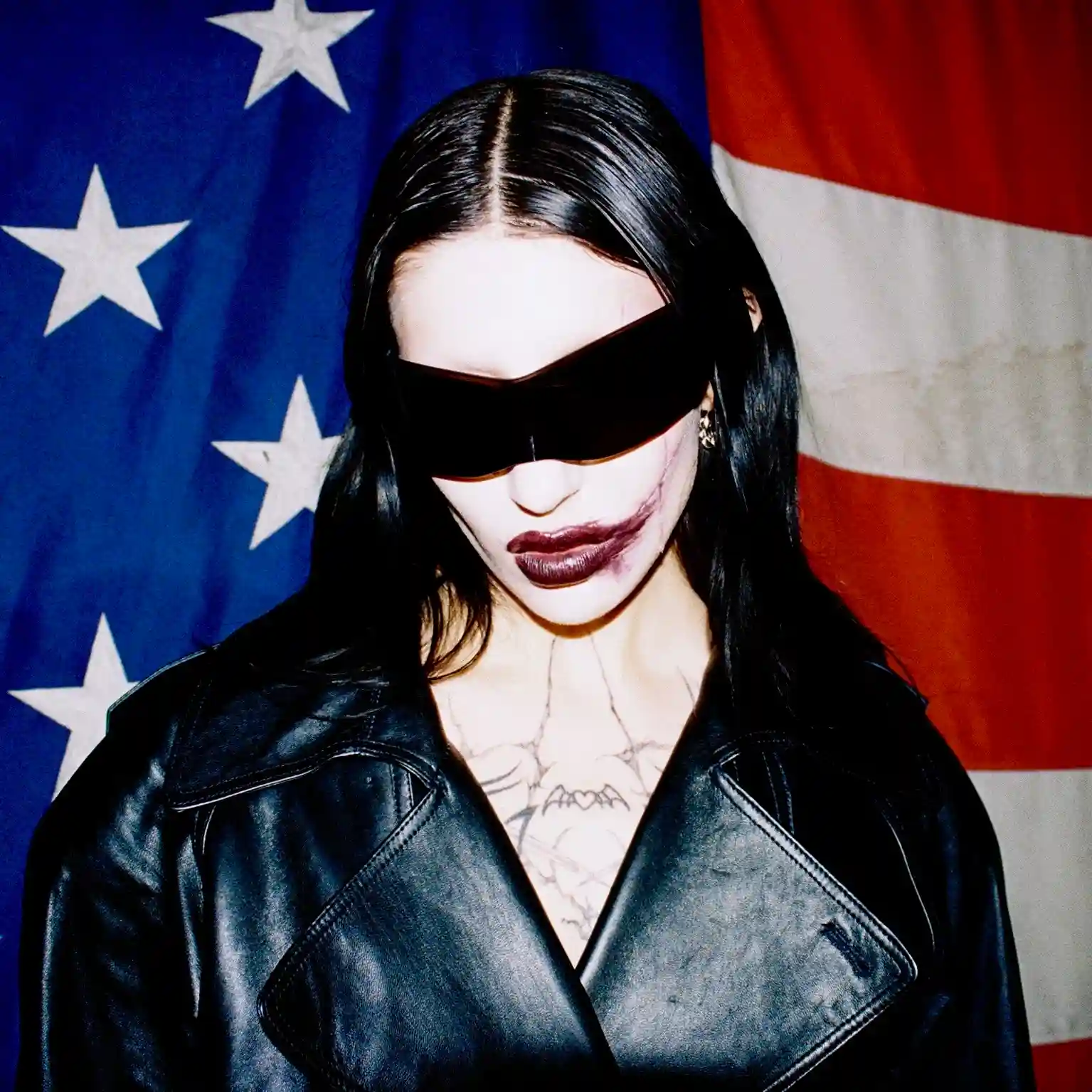 DeathByRomy looking fierce in flag background 